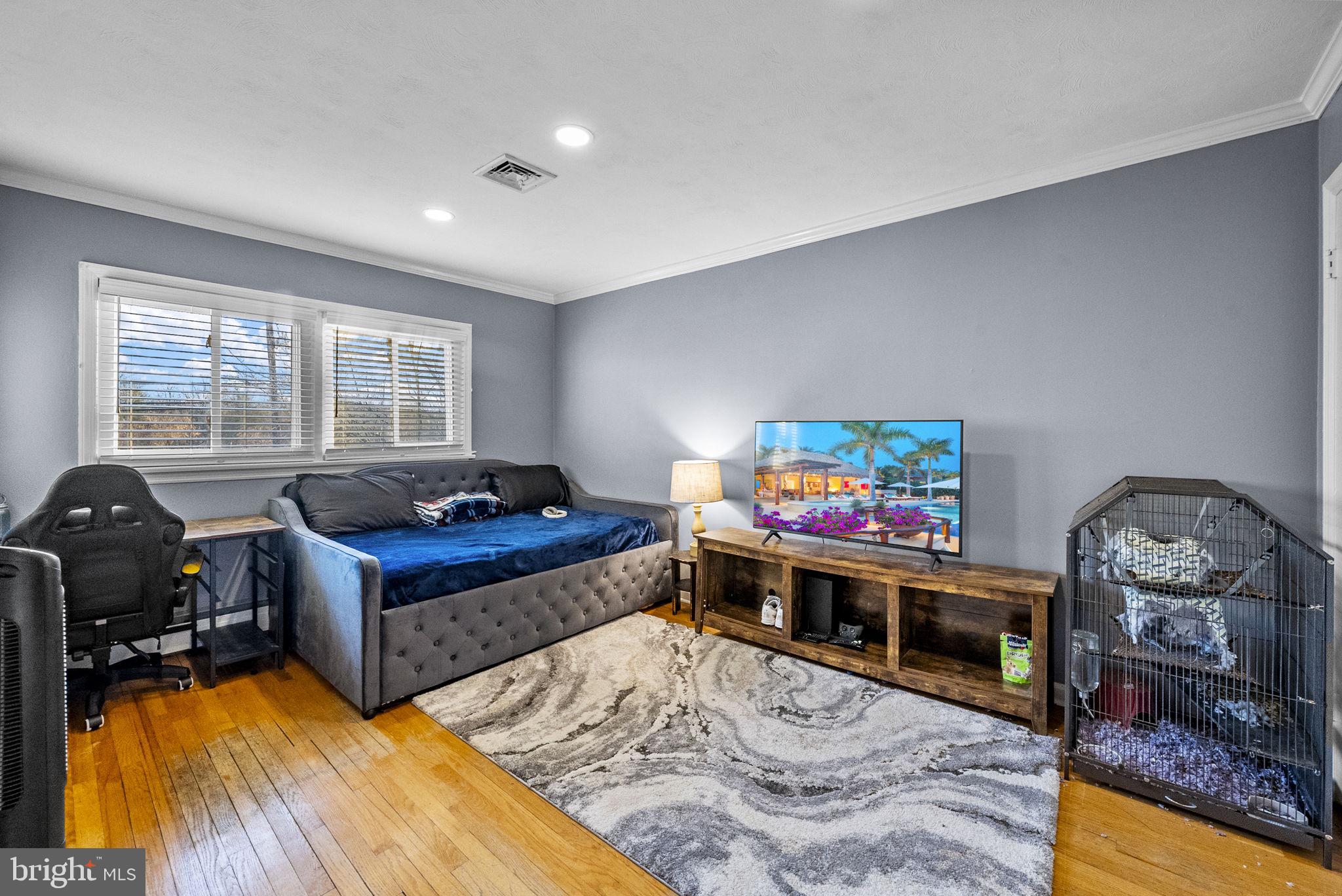 247 Washington Crossing Pennington Road Titusville, NJ 08560 - Photo 27 of 53 a living room with furniture a flat screen tv and a fireplace