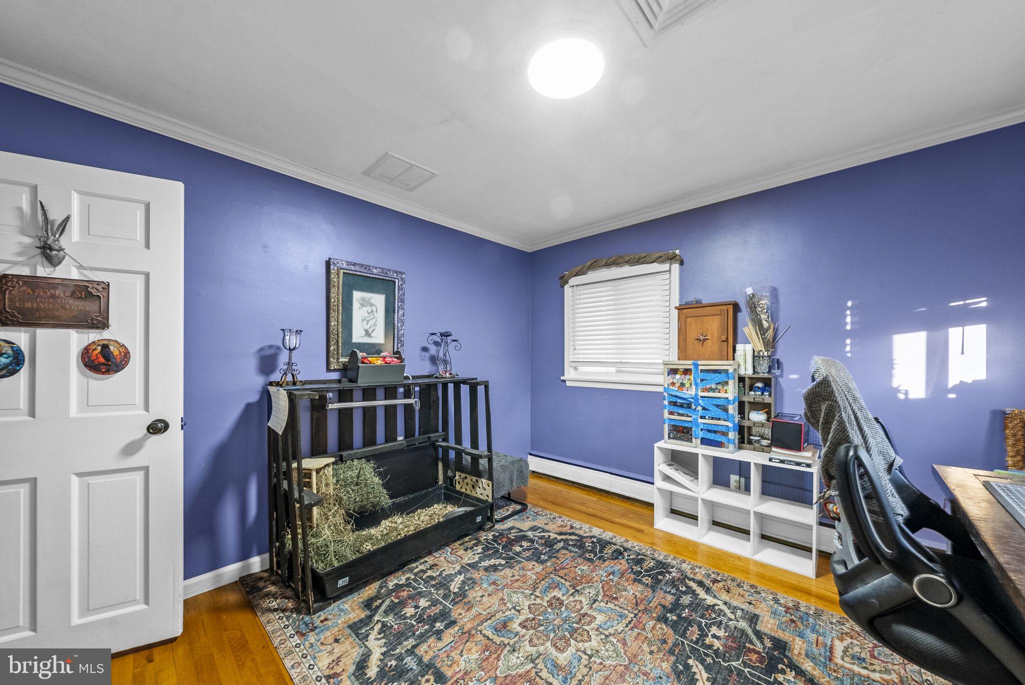 247 Washington Crossing Pennington Road Titusville, NJ 08560 - Photo 32 of 53 a bedroom with furniture and a wooden floor