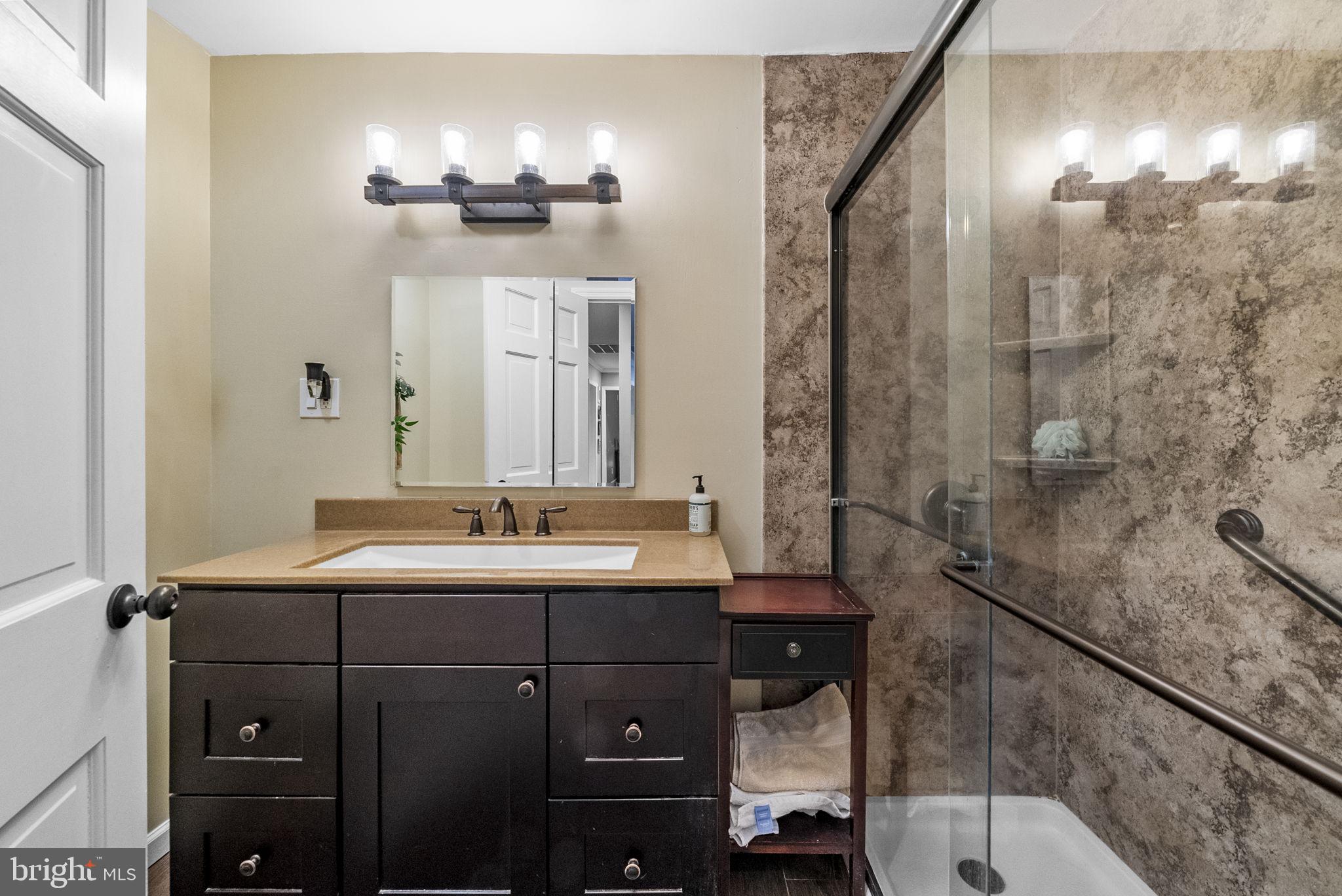 247 Washington Crossing Pennington Road Titusville, NJ 08560 - Photo 33 of 53 a bathroom with a sink and a mirror