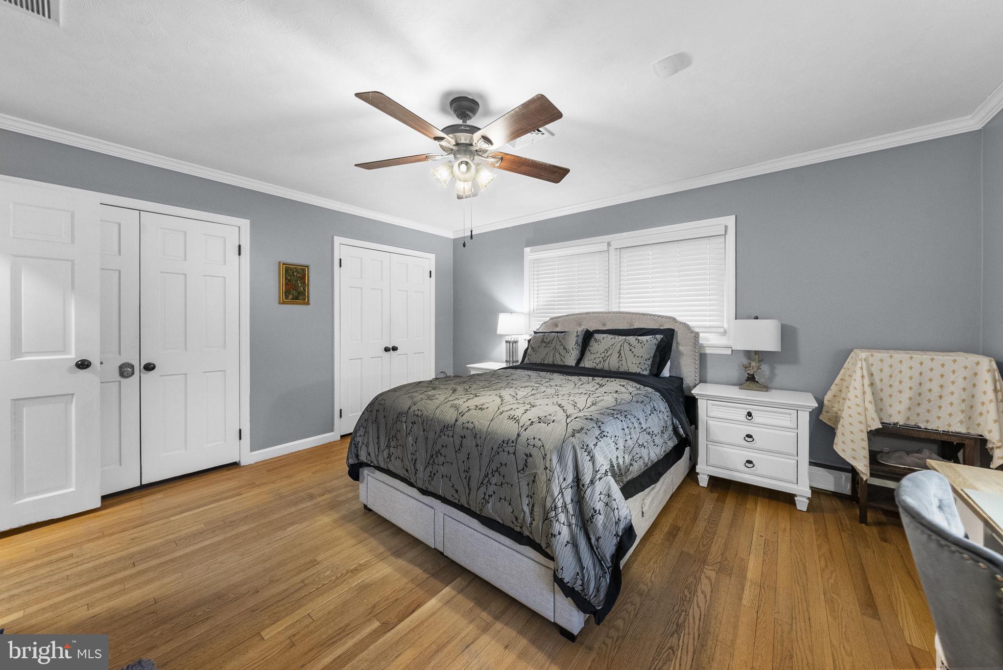 247 Washington Crossing Pennington Road Titusville, NJ 08560 - Photo 36 of 53 a spacious bedroom with a bed and wooden floor