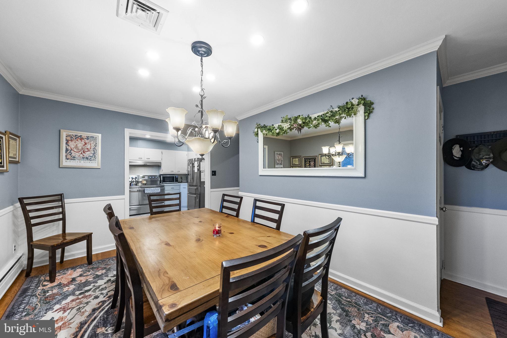 247 Washington Crossing Pennington Road Titusville, NJ 08560 - Photo 44 of 53 a view of a dining room with furniture and a chandelier