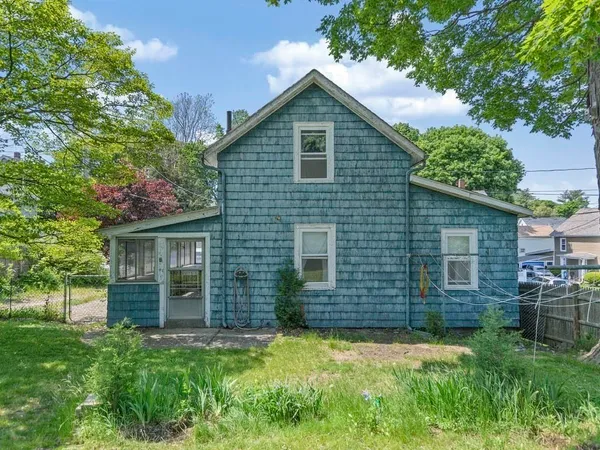 a view of backyard of a house