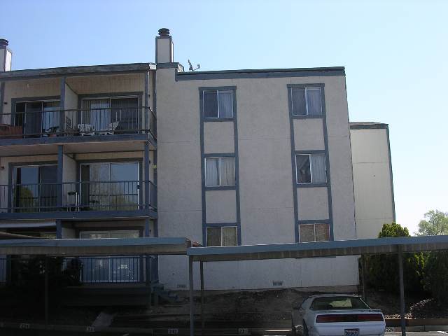 2555 Clear Acre Lane, Unit 731 Reno, NV 89512 - Photo 1 of 4 a front view of house with yard