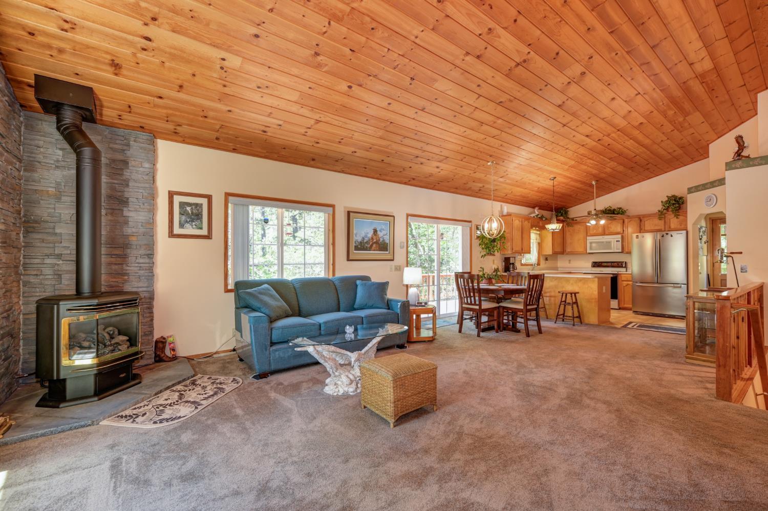23998 Stable Road Sonora, CA 95370 - Photo 7 of 41 a living room with furniture and a couch