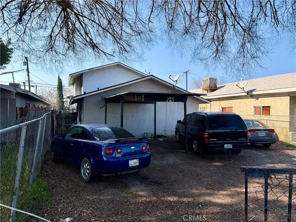 a car parked in front of a house