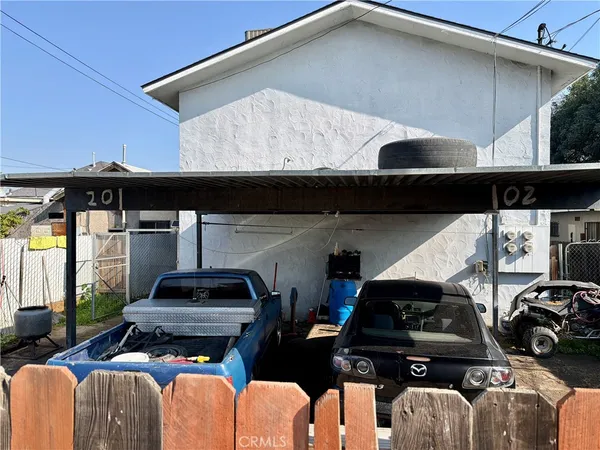 a car parked in front of a house