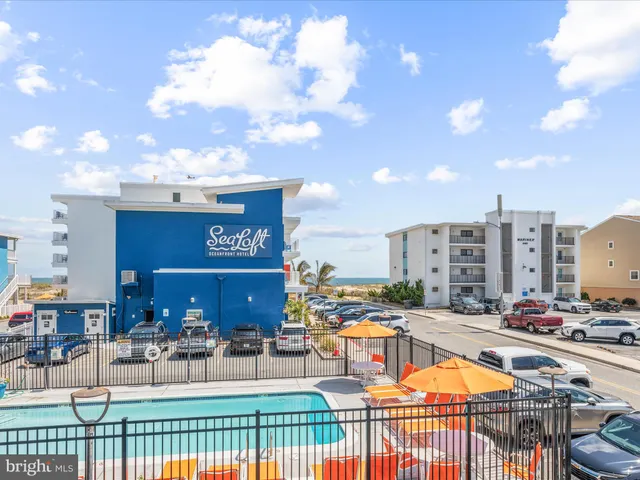 a view of a play ground in front of the house