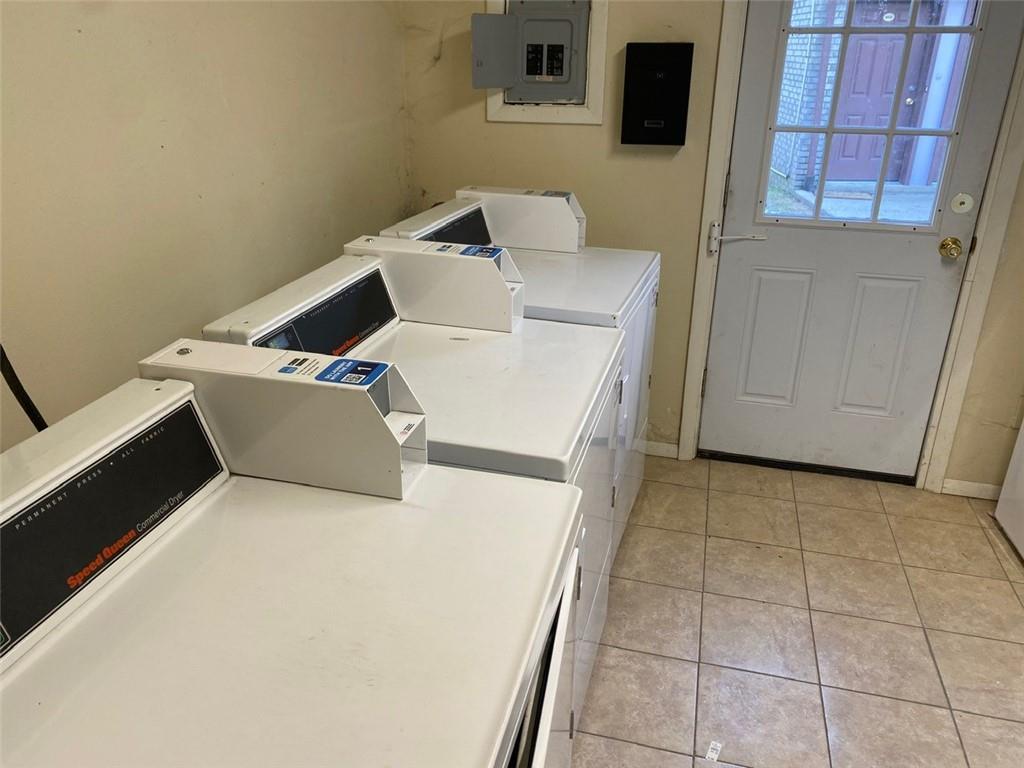 500 Milltown Road, Unit 506 New Kensington, PA 15068 - Photo 21 of 23 a utility room with dryer and washer