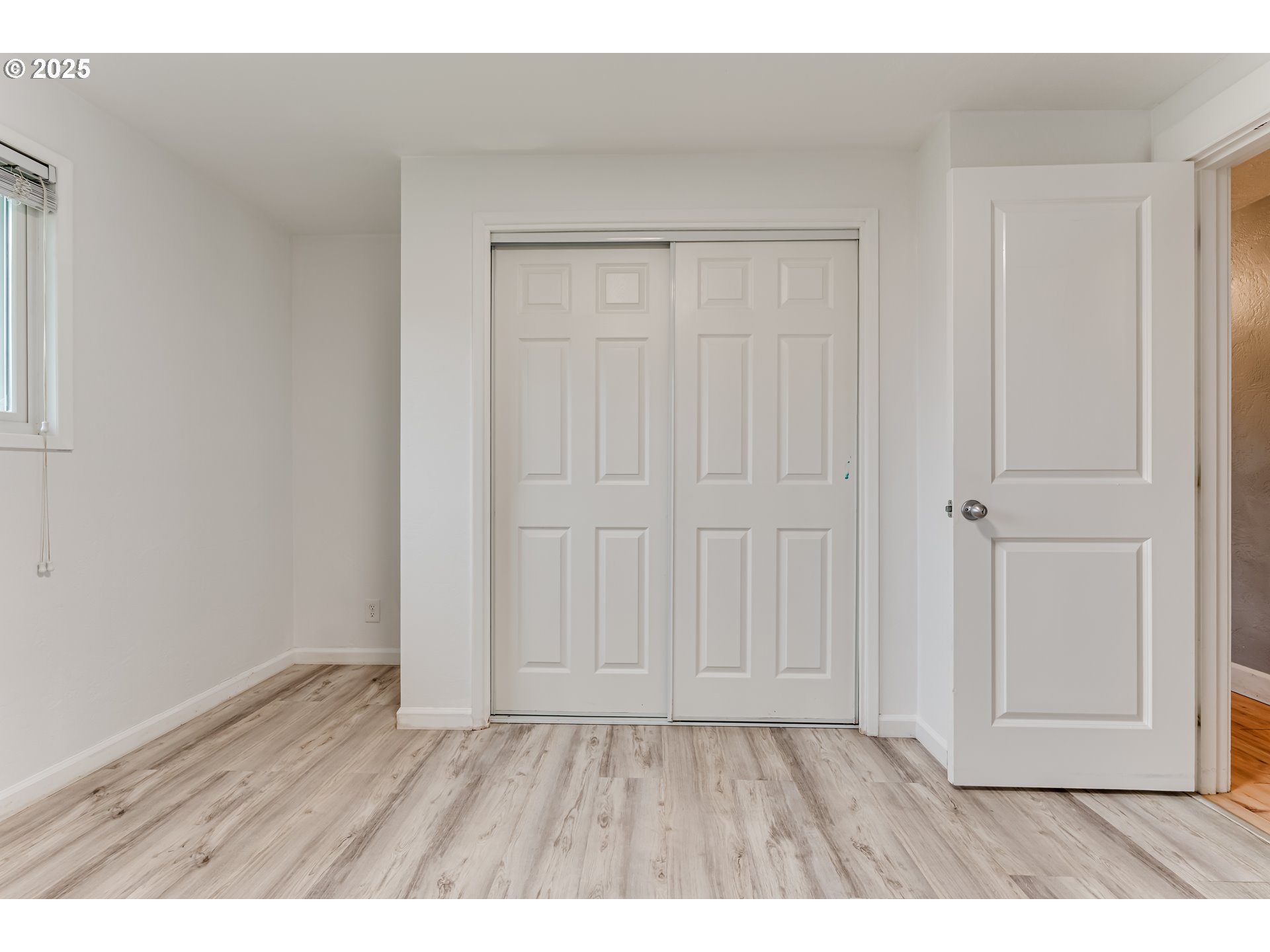 2230 Viewmont Avenue Springfield, OR 97477 - Photo 22 of 40 a view of an empty room with wooden floor