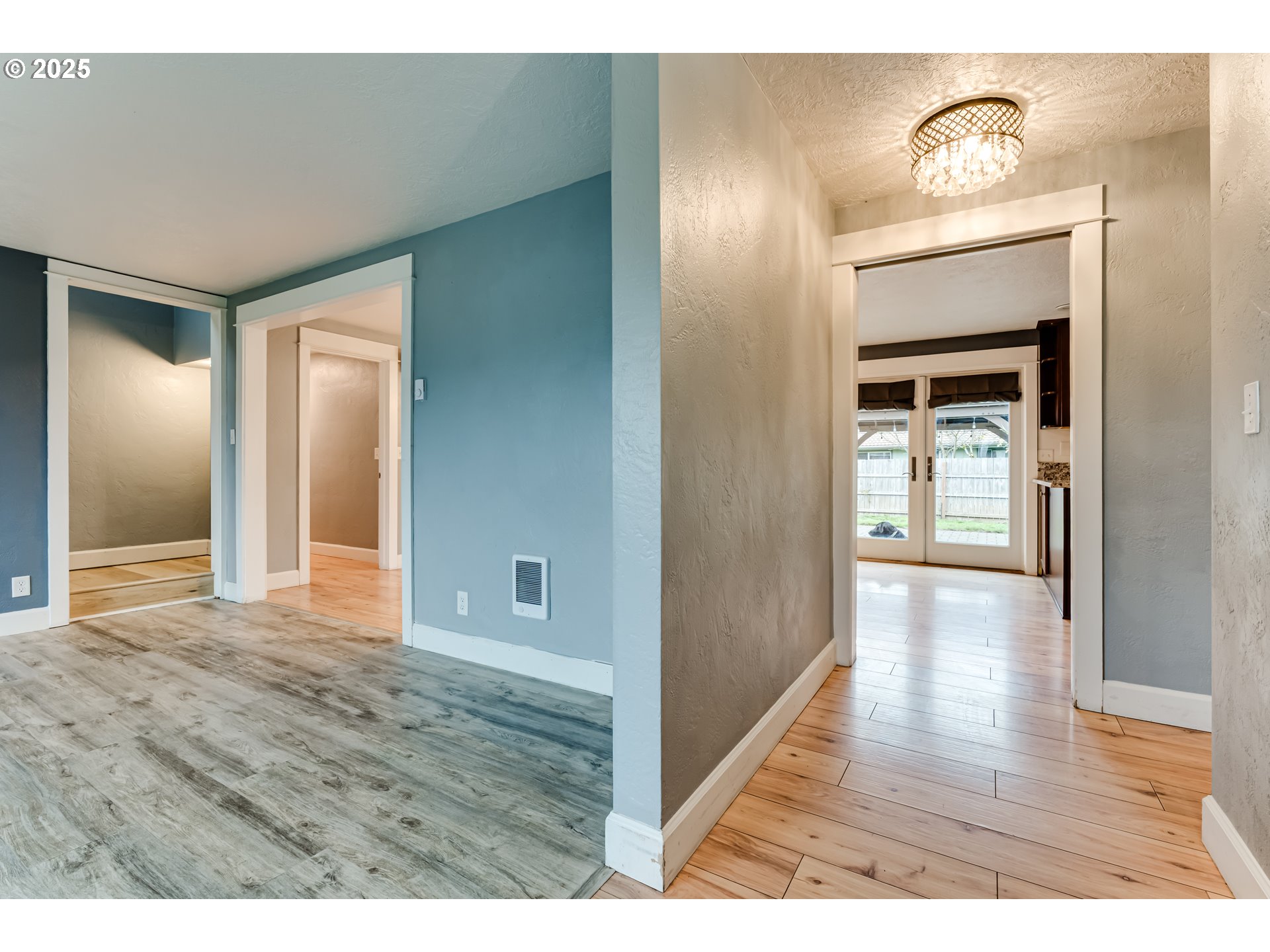 2230 Viewmont Avenue Springfield, OR 97477 - Photo 4 of 40 a view of a hallway with wooden floor