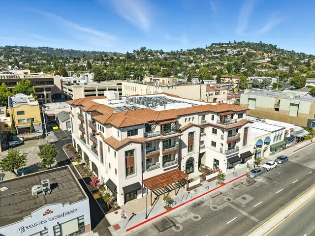 a view of a city with an ocean view