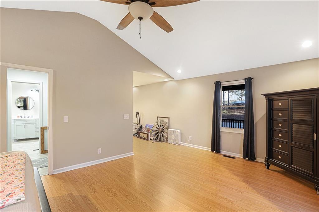 315 Laurel Road Carrollton, GA 30117 - Photo 19 of 30 a bed room with a bed and furniture