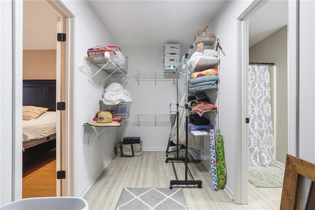 315 Laurel Road Carrollton, GA 30117 - Photo 24 of 30 a bedroom with a bed and a window
