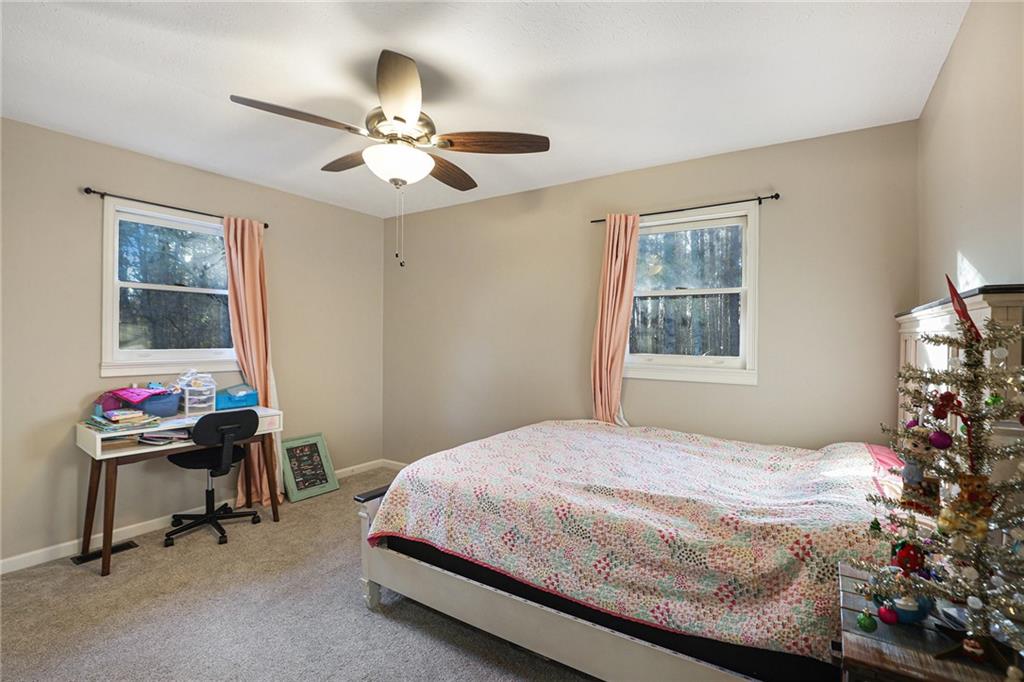 315 Laurel Road Carrollton, GA 30117 - Photo 25 of 30 a bedroom with a bed and a window