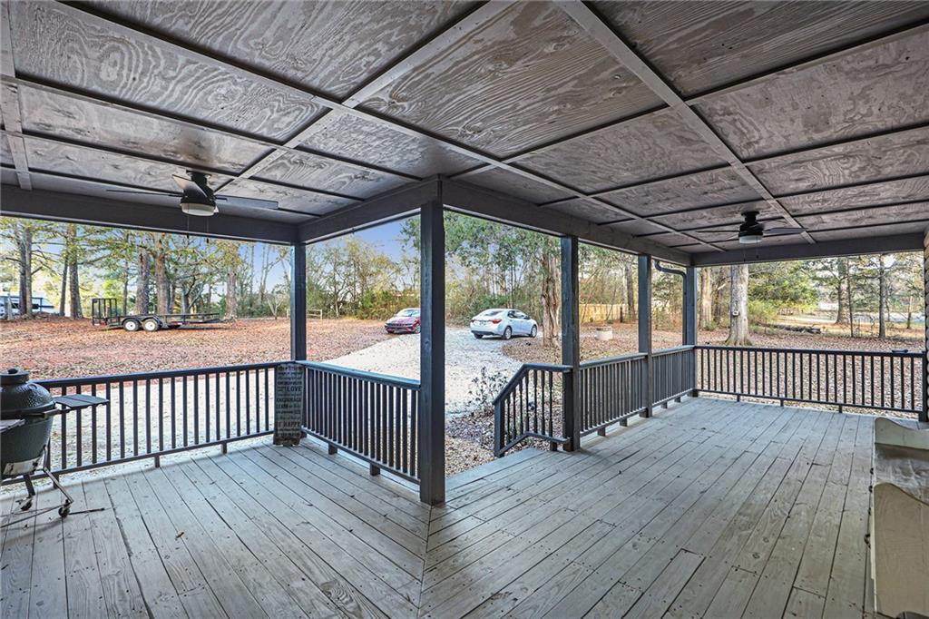 315 Laurel Road Carrollton, GA 30117 - Photo 3 of 30 a view of a porch with wooden floor