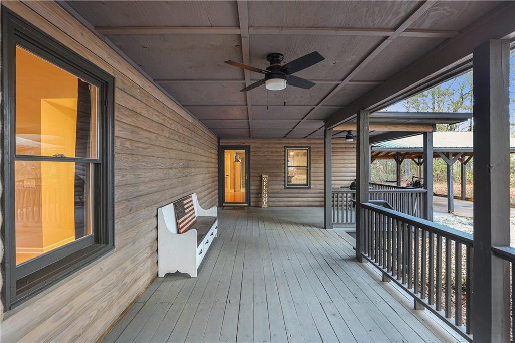 315 Laurel Road Carrollton, GA 30117 - Photo 4 of 30 a view of empty room with wooden floor and fan