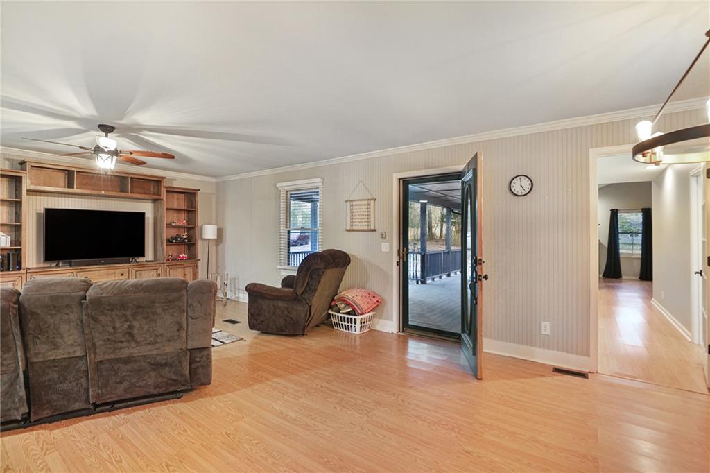 315 Laurel Road Carrollton, GA 30117 - Photo 6 of 30 a living room with furniture and a flat screen tv