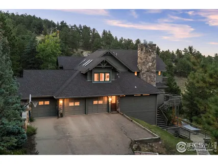 a view of a town with barn house