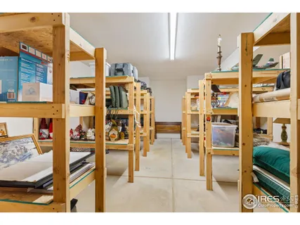 a balcony with furniture and floor to ceiling window