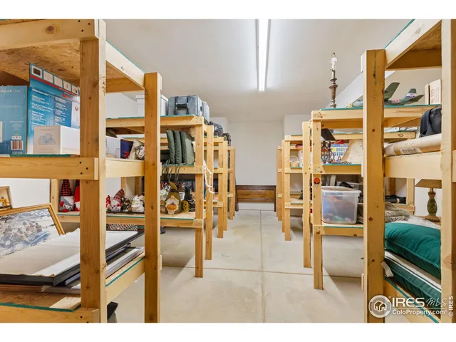 a balcony with furniture and floor to ceiling window