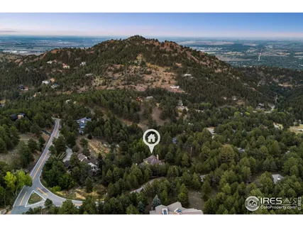 a view of city and green space