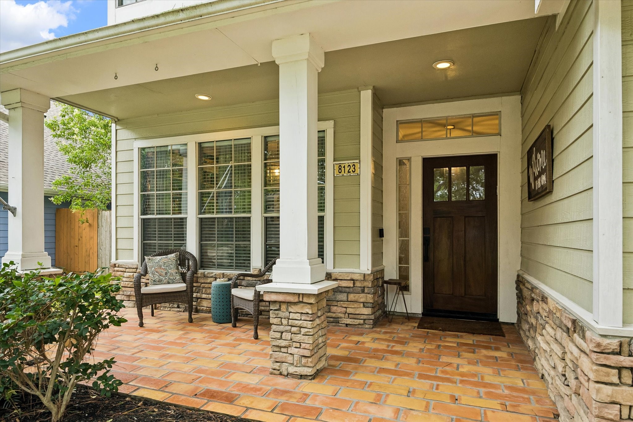 8123 Clarion Way Houston, TX 77040 - Photo 4 of 33 a building outdoor space with patio furniture and potted plants