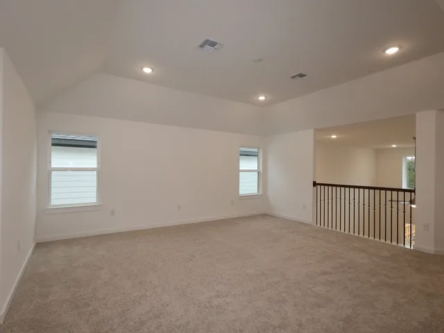 an empty room with windows