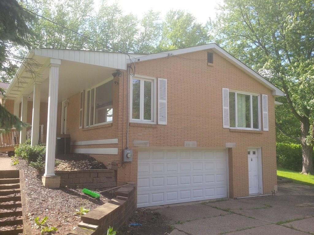 4511 Battle Ridge Road Oakdale, PA 15071 - Photo 2 of 24 right side view with 2 car garage