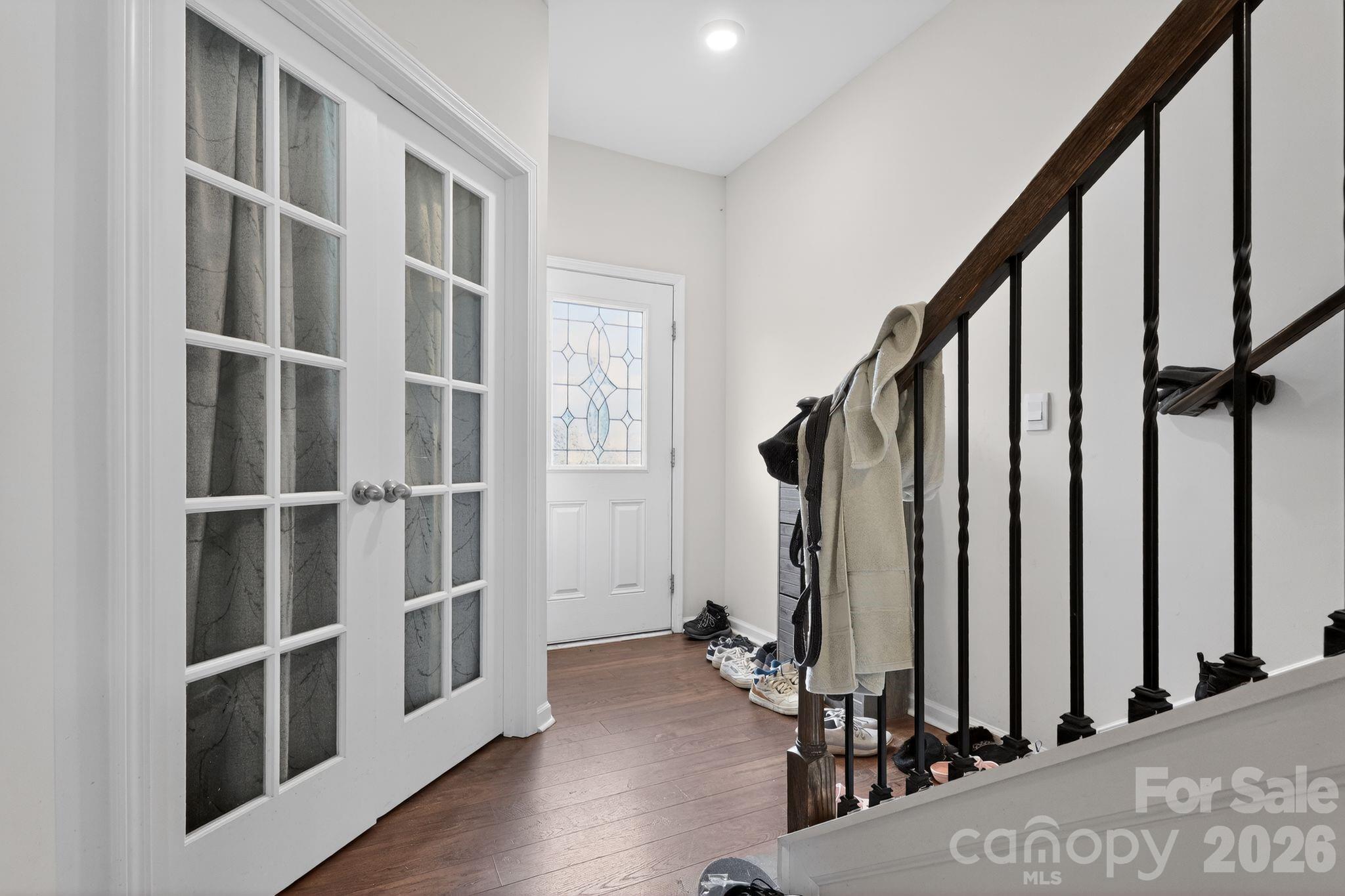 137 North Ranney Way Mooresville, NC 28117 - Photo 11 of 30 a view of an entryway with wooden floor and door