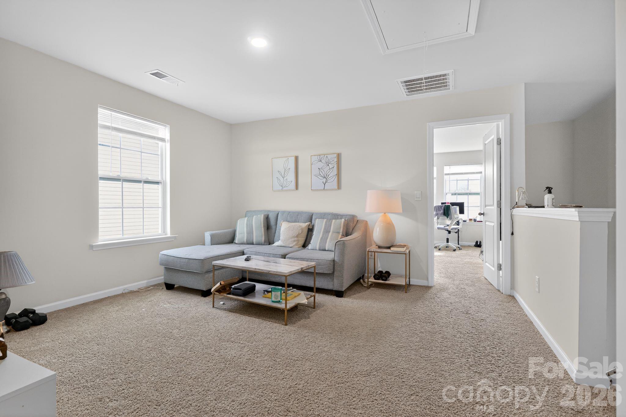 137 North Ranney Way Mooresville, NC 28117 - Photo 14 of 30 a living room with furniture and a window