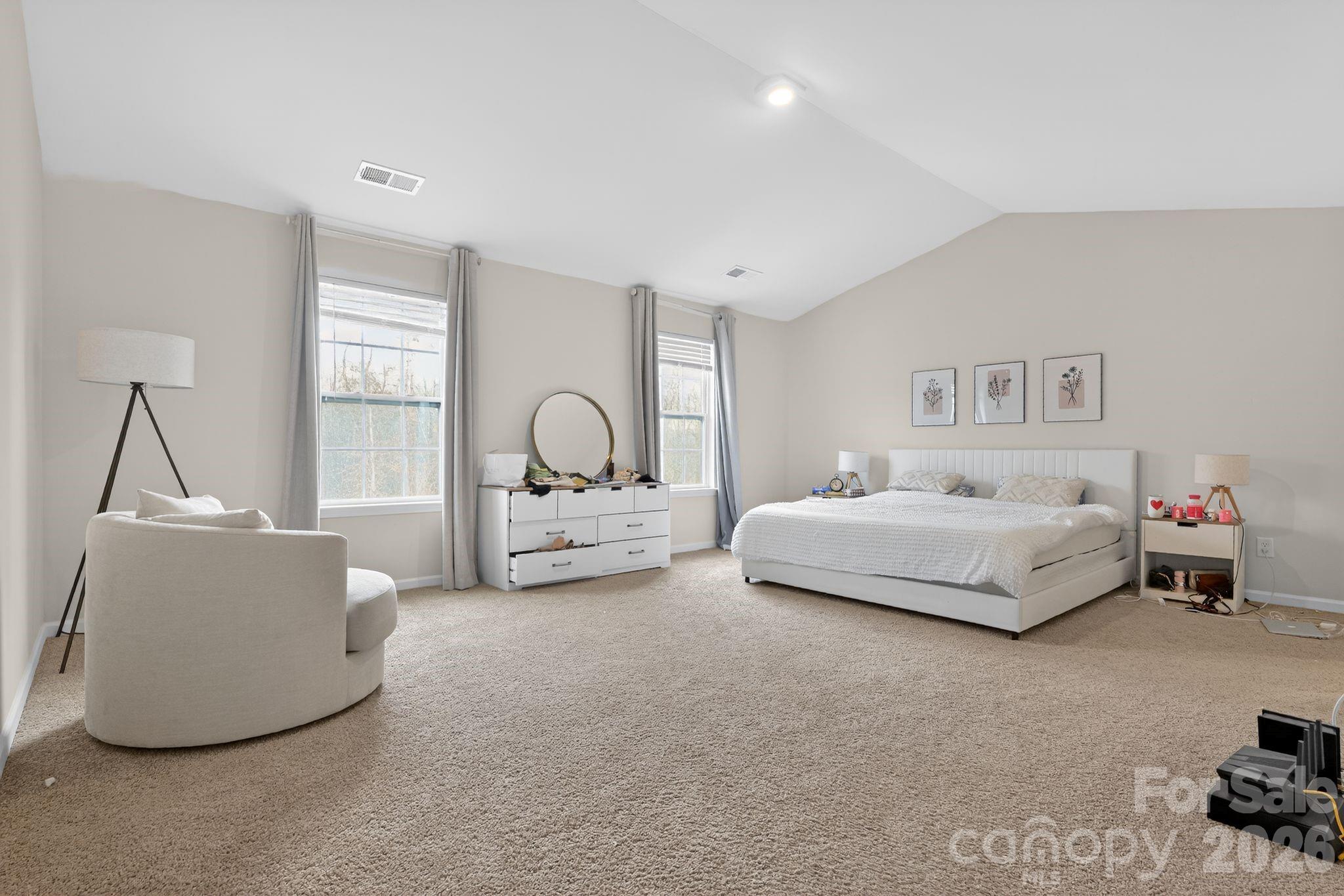 137 North Ranney Way Mooresville, NC 28117 - Photo 15 of 30 a bedroom with bed and a couch