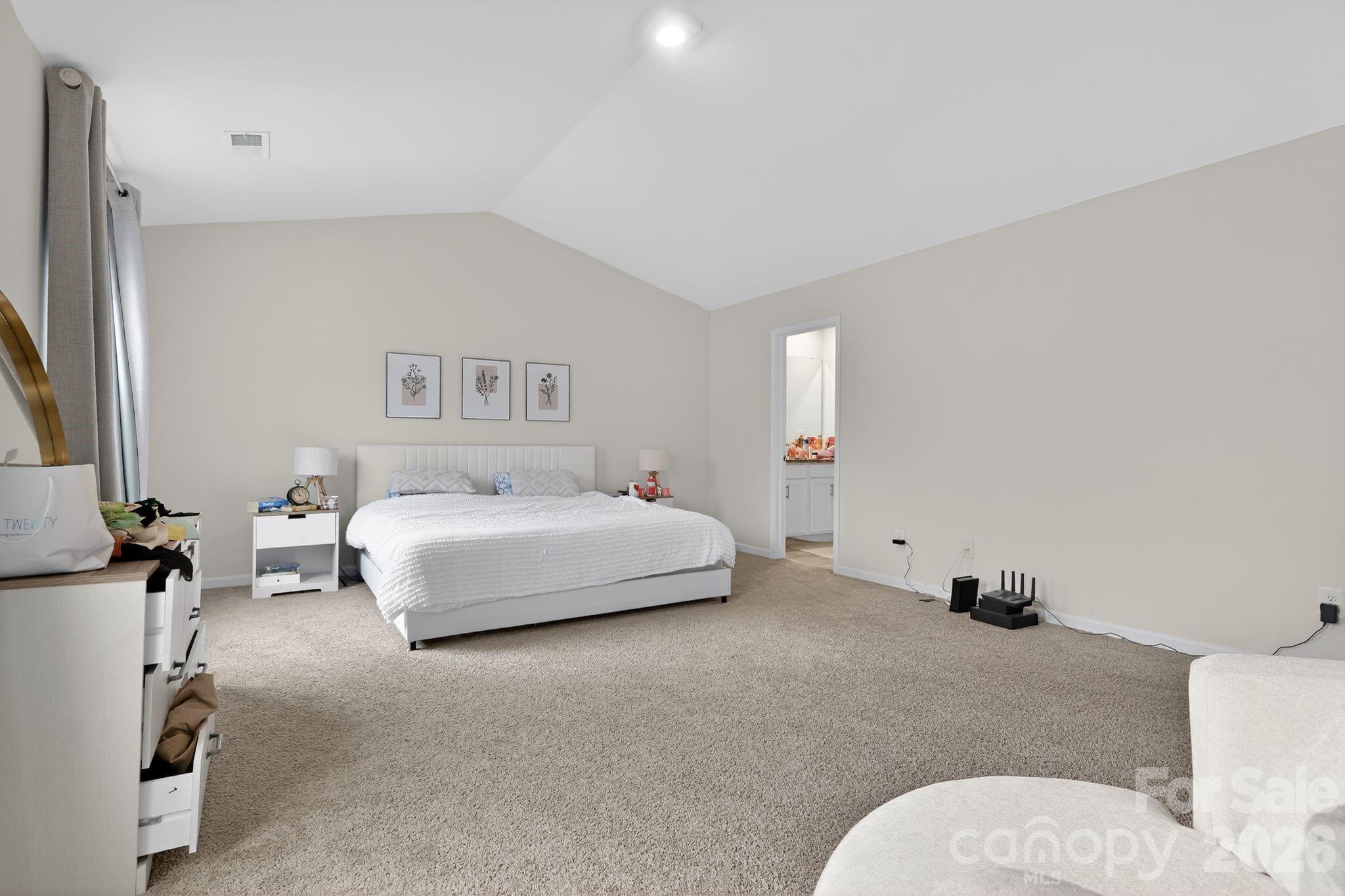 137 North Ranney Way Mooresville, NC 28117 - Photo 16 of 30 a bedroom with a bed and a couch