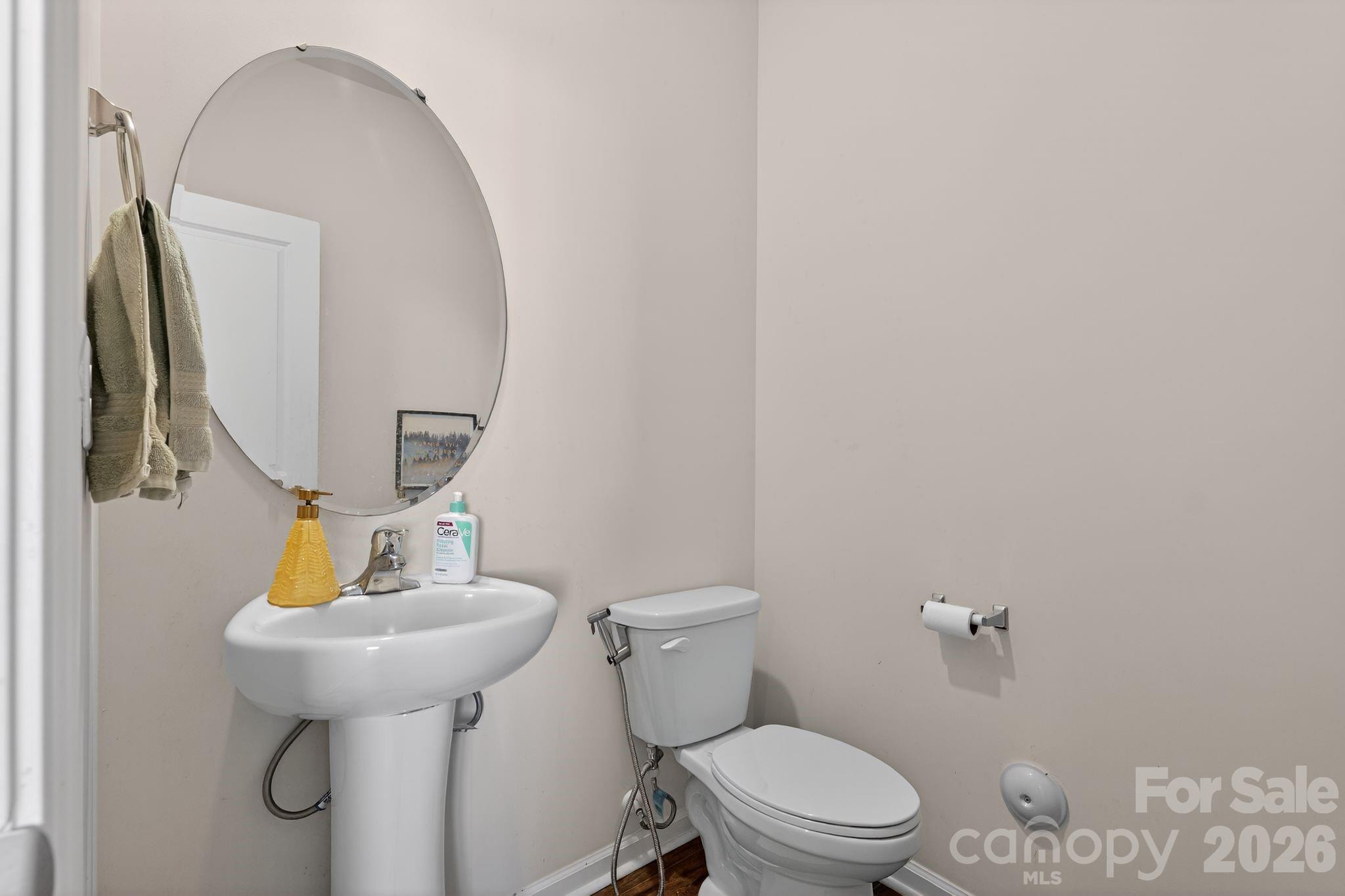 137 North Ranney Way Mooresville, NC 28117 - Photo 10 of 30 a bathroom with a toilet sink and mirror