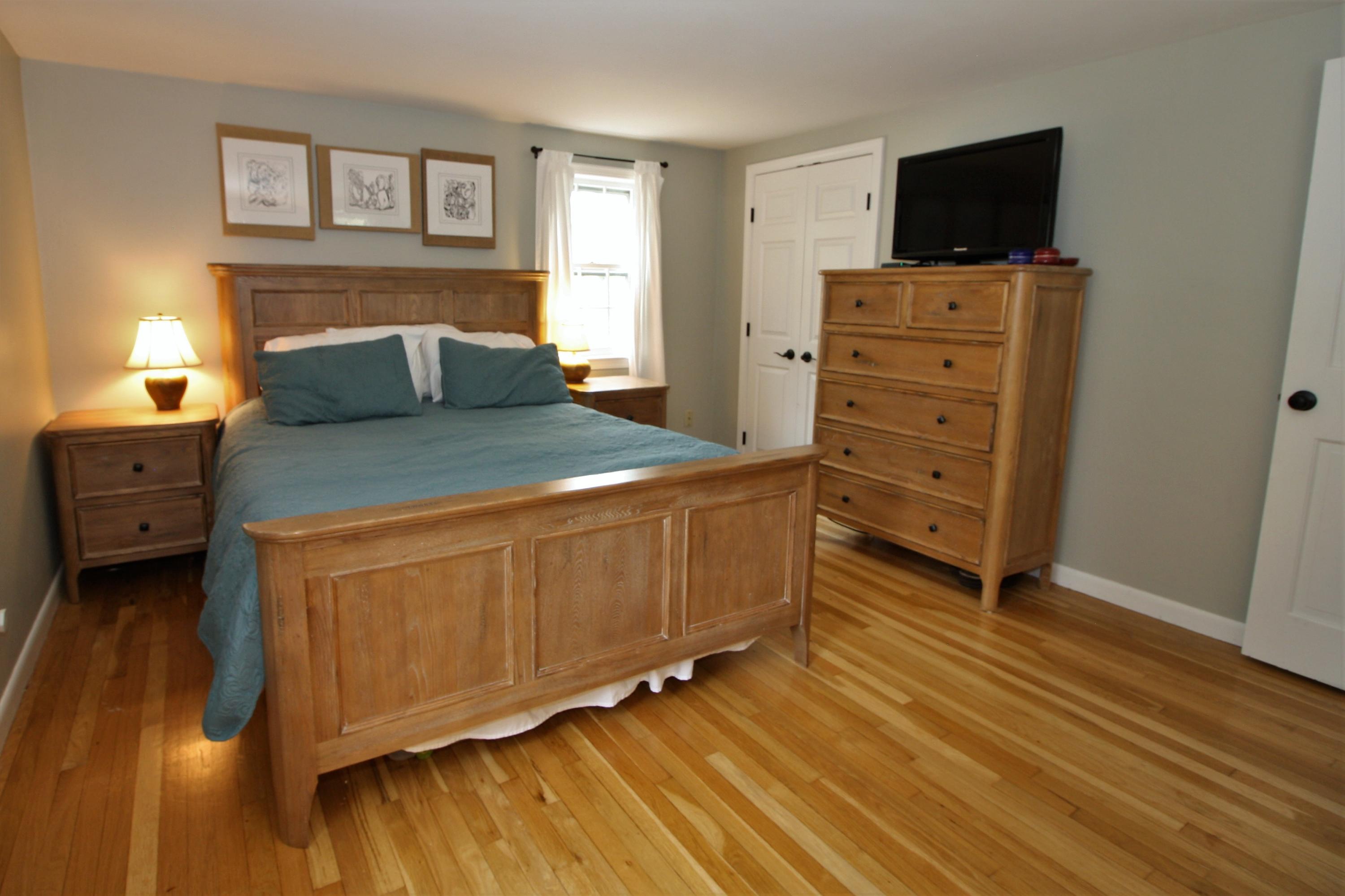 109 Pompano Road Yarmouth Port, MA 02675 - Photo 16 of 42 a bedroom with a bed and a television