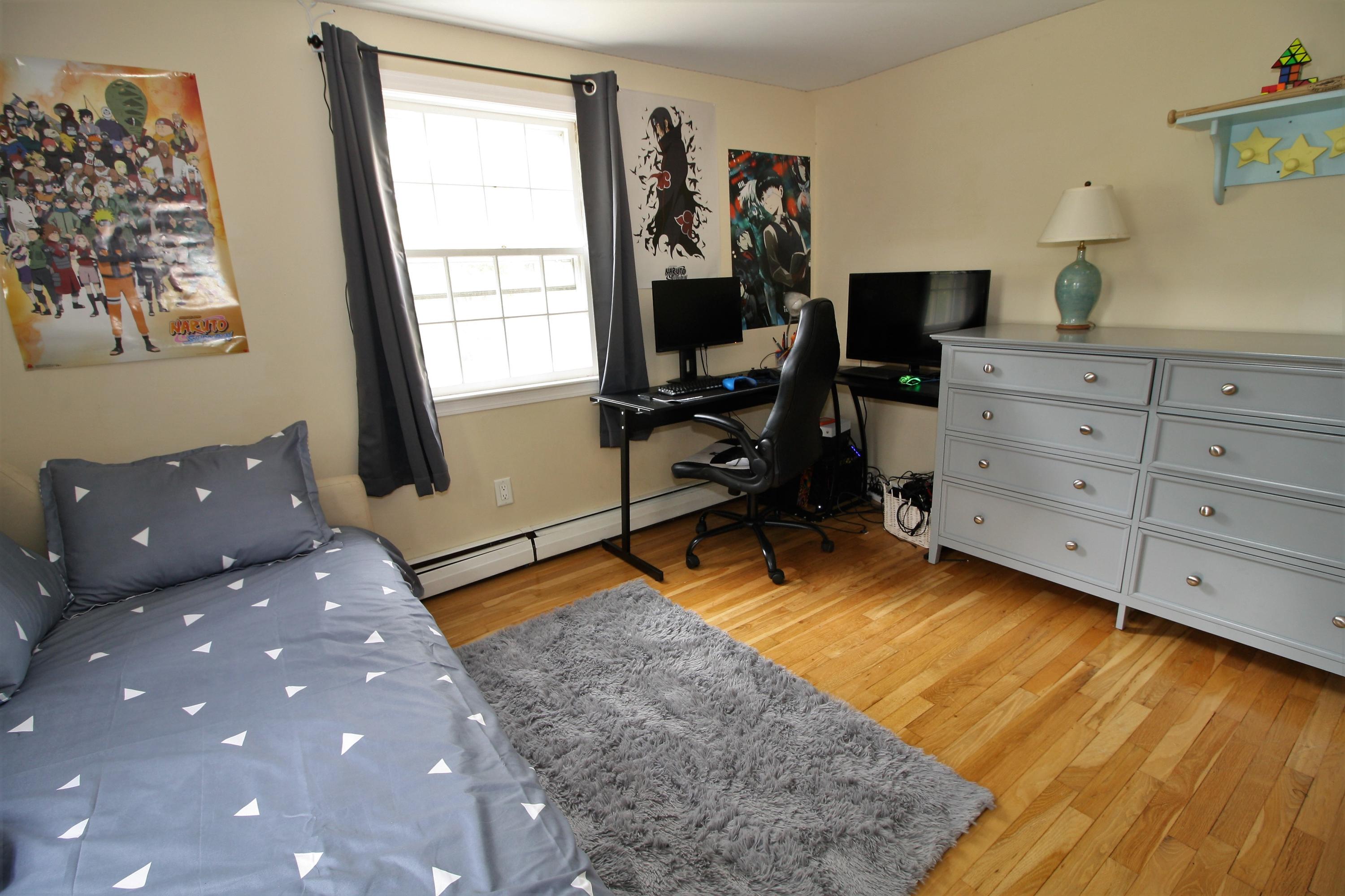 109 Pompano Road Yarmouth Port, MA 02675 - Photo 21 of 42 a living room with furniture and a flat screen tv