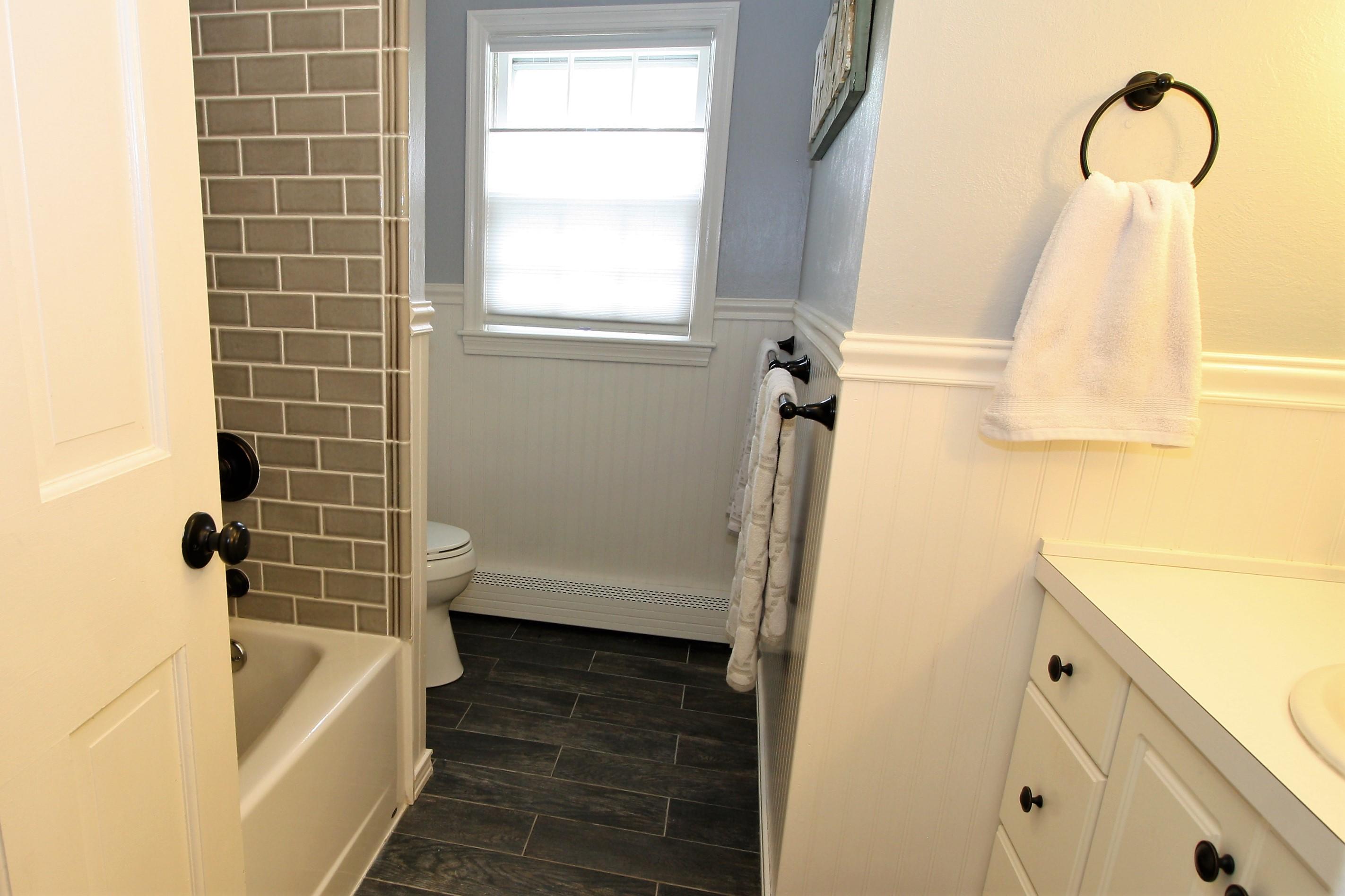 109 Pompano Road Yarmouth Port, MA 02675 - Photo 22 of 42 a bathroom with a sink a bathtub and window