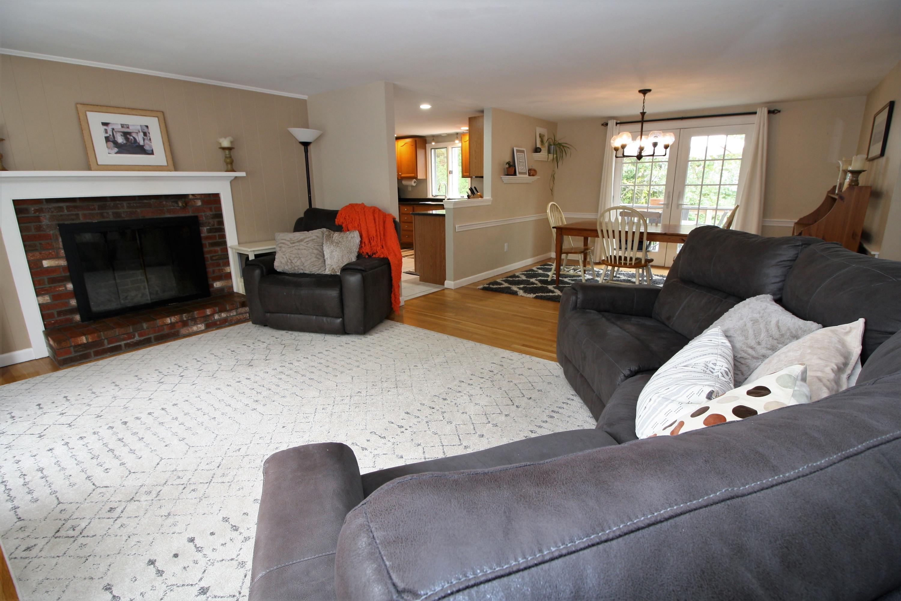 109 Pompano Road Yarmouth Port, MA 02675 - Photo 3 of 42 a living room with furniture fireplace and window