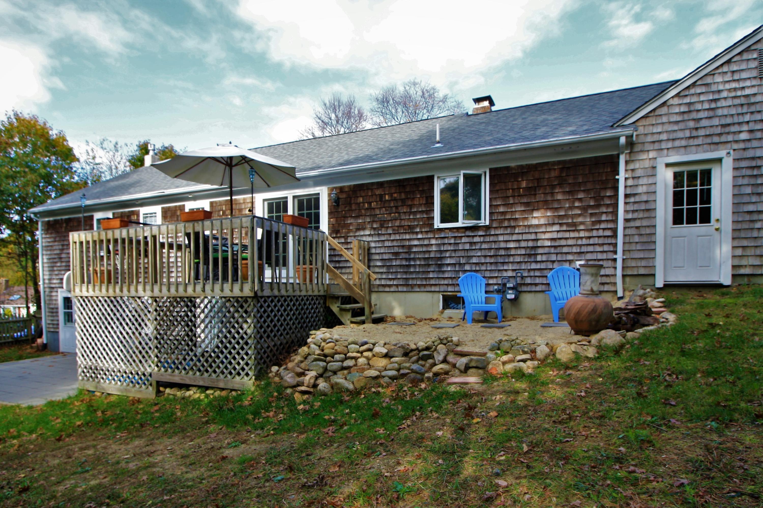 109 Pompano Road Yarmouth Port, MA 02675 - Photo 33 of 42 a view of a house with wooden fence