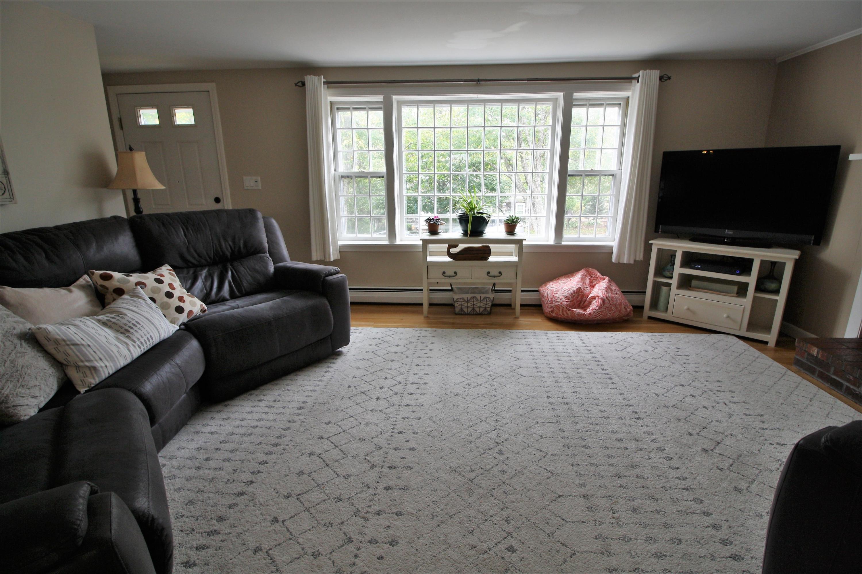 109 Pompano Road Yarmouth Port, MA 02675 - Photo 4 of 42 a living room with furniture and a flat screen tv