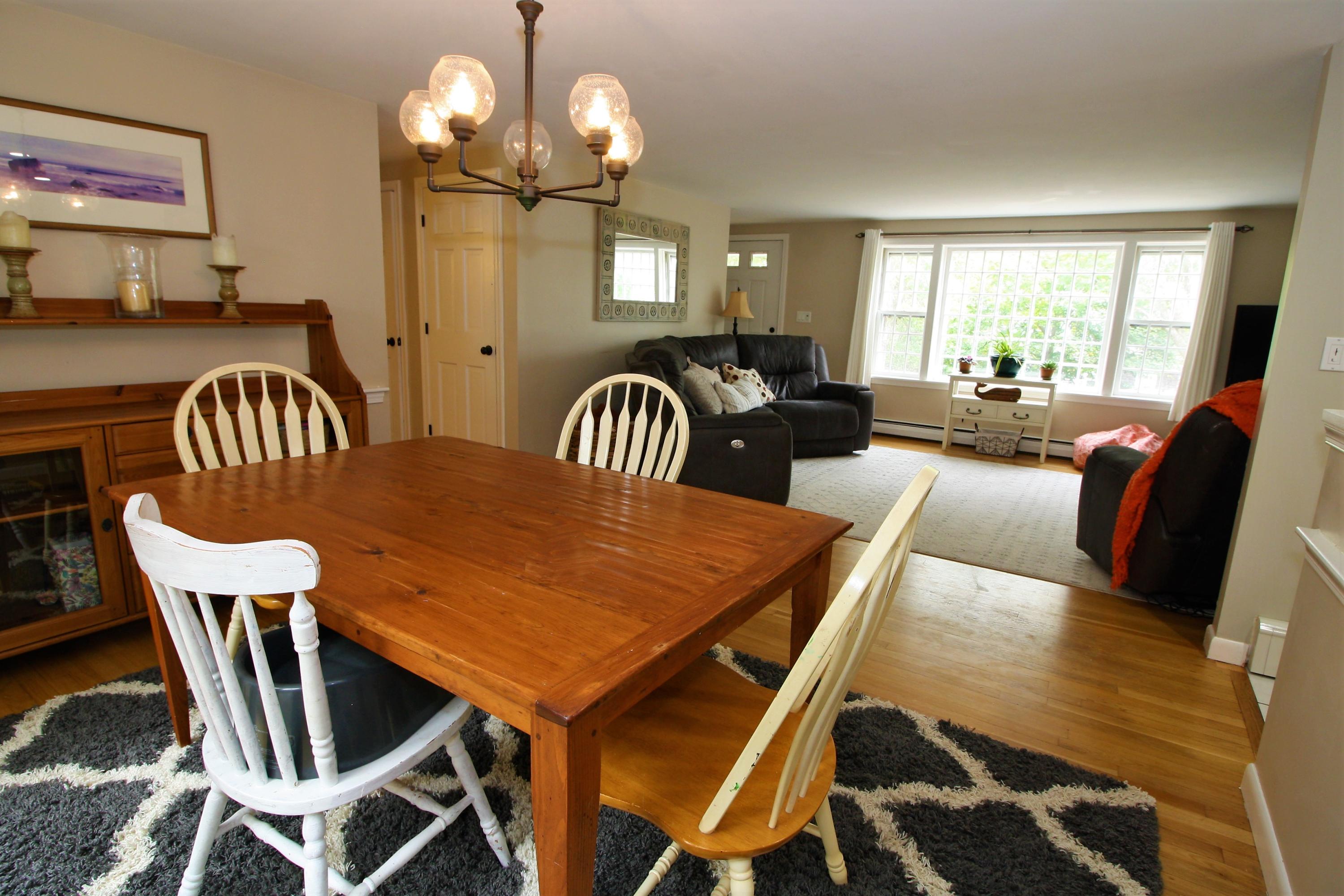 109 Pompano Road Yarmouth Port, MA 02675 - Photo 5 of 42 a view of a dining room with furniture