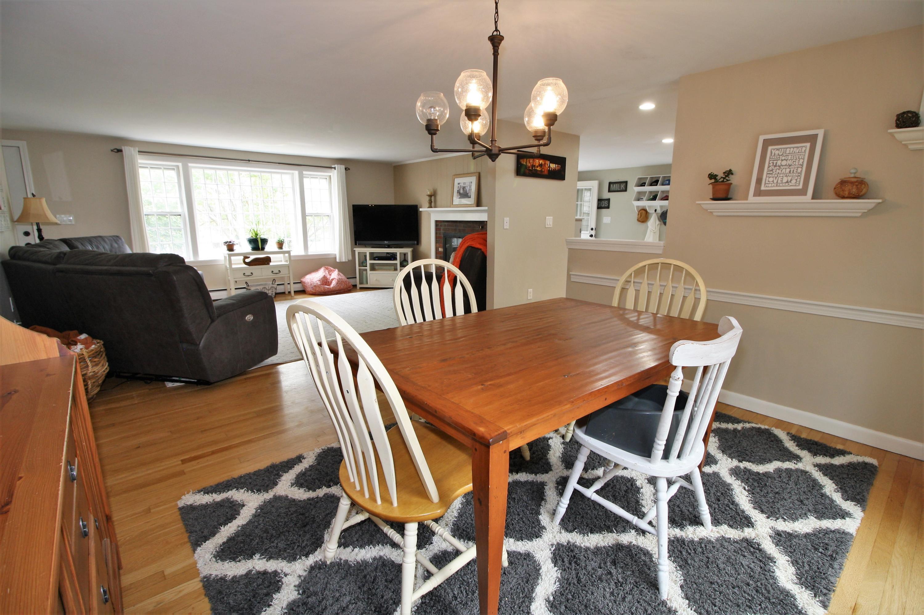 109 Pompano Road Yarmouth Port, MA 02675 - Photo 6 of 42 a view of a dining room with furniture