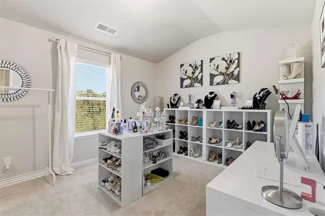 a bed room with furniture and a window