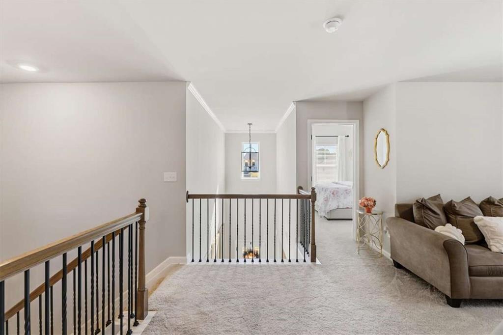 1171 Bodega Loop Locust Grove, GA 30248 - Photo 36 of 57 a bed room with furniture and a window