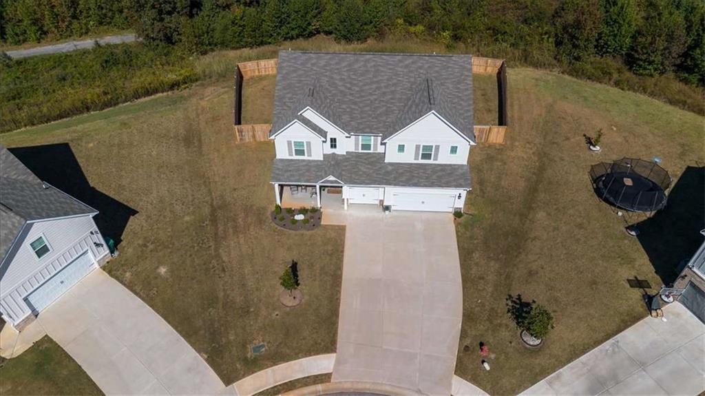 1171 Bodega Loop Locust Grove, GA 30248 - Photo 46 of 57 an aerial view of a house with a yard