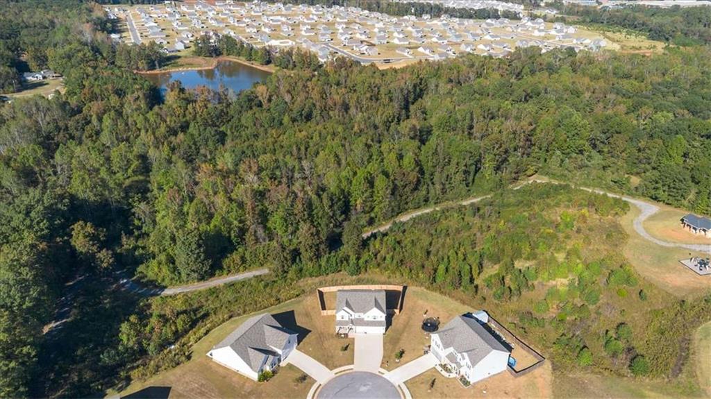 1171 Bodega Loop Locust Grove, GA 30248 - Photo 52 of 57 a view of a balcony with chairs