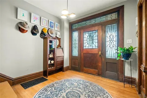a view of an entryway with a chandelier