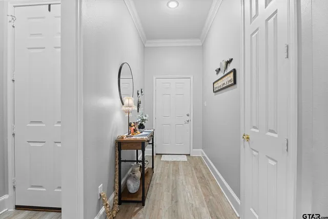 a view of a livingroom with furniture and wooden floor