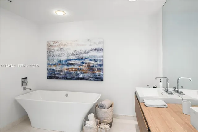 a view of a lake with tall building