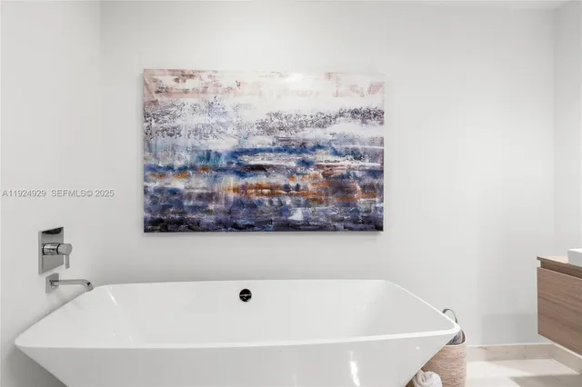 a view of a dining room with furniture and window