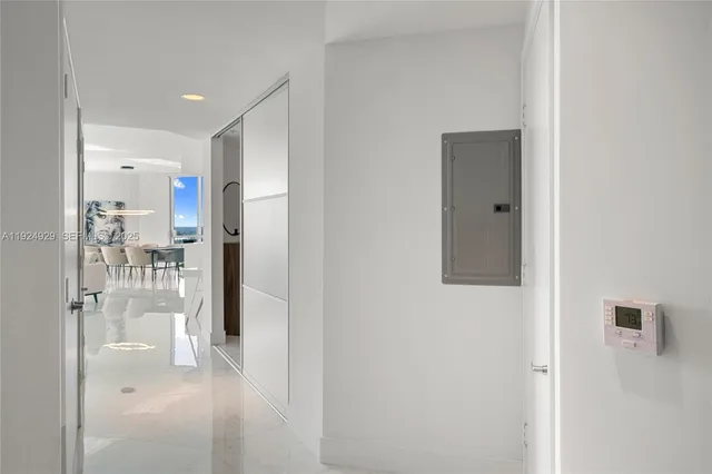 a view of a park with a slide and potted plants